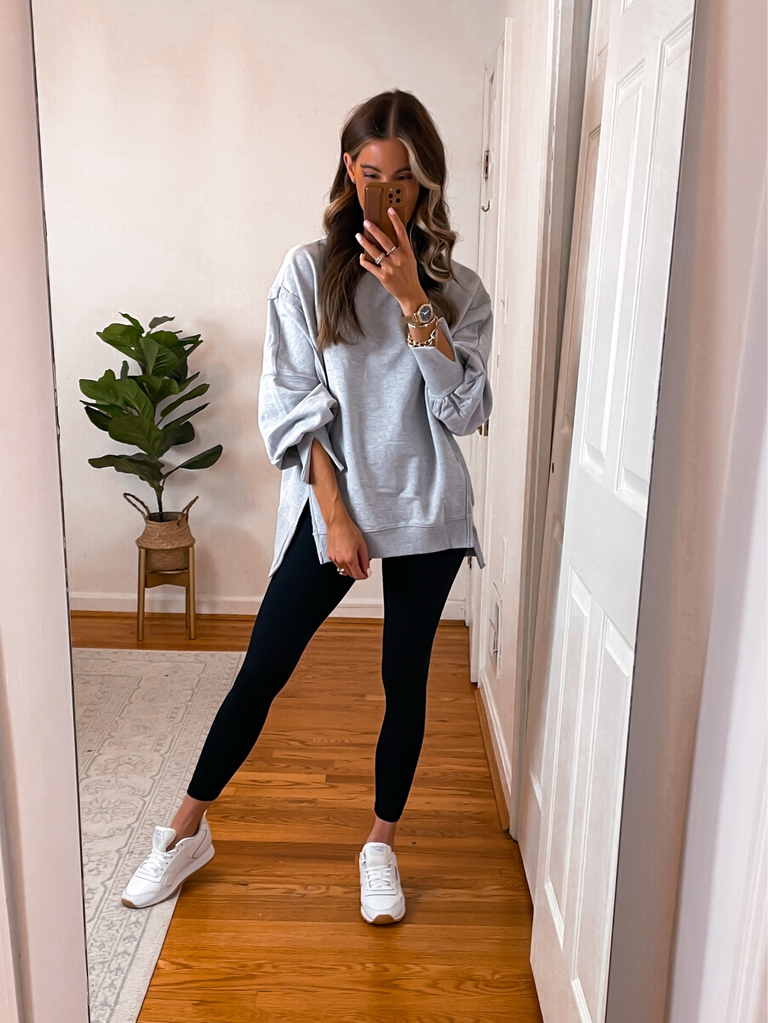 This sweatshirt fits oversize and has the cutest details! Wearing a small. Leggings also fit tts.

#LTKstyletip #LTKSeasonal #LTKshoecrush