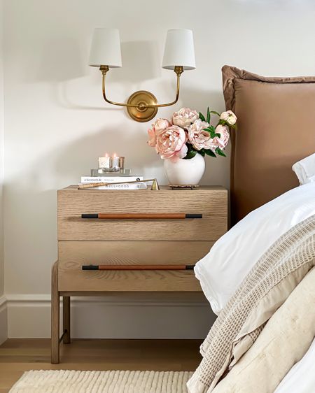 Nightstand 

Sconce, florals, bed 

#LTKfamily #LTKhome #LTKstyletip