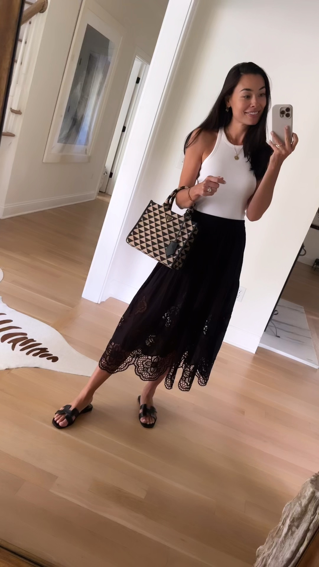 Sezane tank, Chloe eyelet skirt, Hermes sandals, Prada bag. Date night outfit, summer outfit. 

#LTKStyleTip #LTKSeasonal #LTKItBag