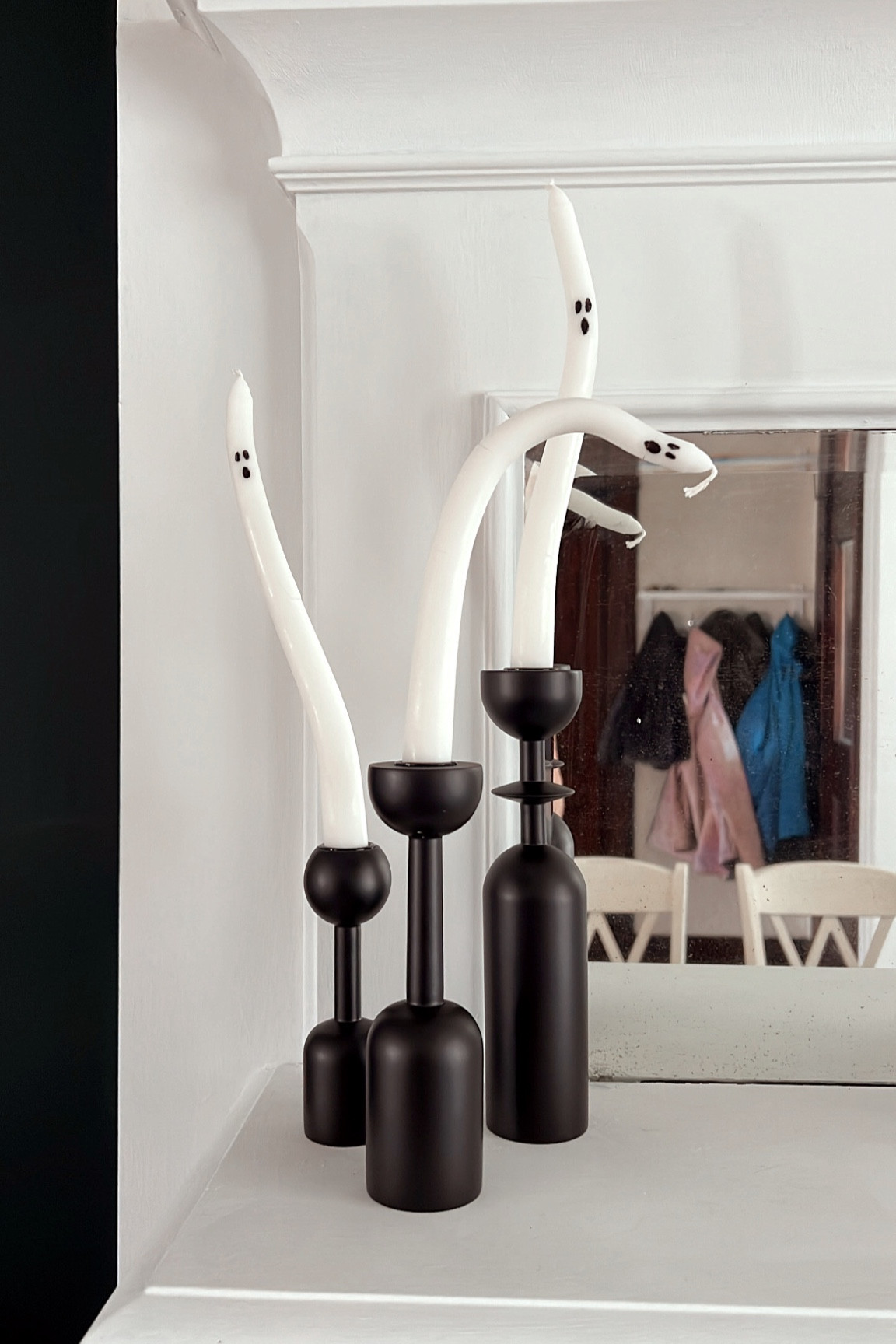 This cute Halloween candle DIY is the perfect way to add a little whimsy to your home decor. Melt tapered candles in hot water, mold them, add some boo faces on your new ghosts, and you’re set! #diy #halloween #halloweendiy #ghostcandles 

#LTKHalloween #LTKSeasonal #LTKhome