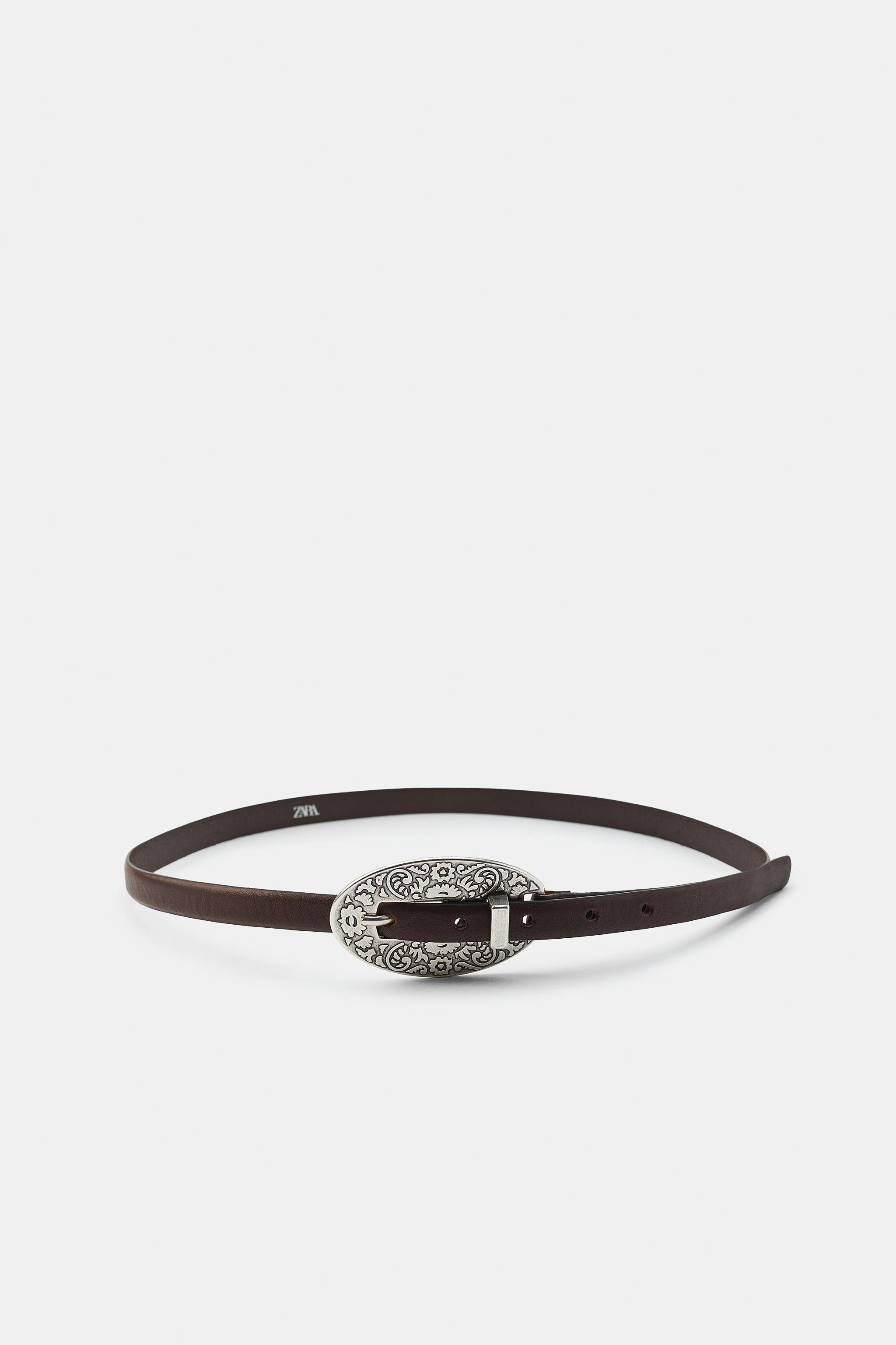 1.5 cm belt made from 100% leather. Features an engraved metal buckle. | Zara US