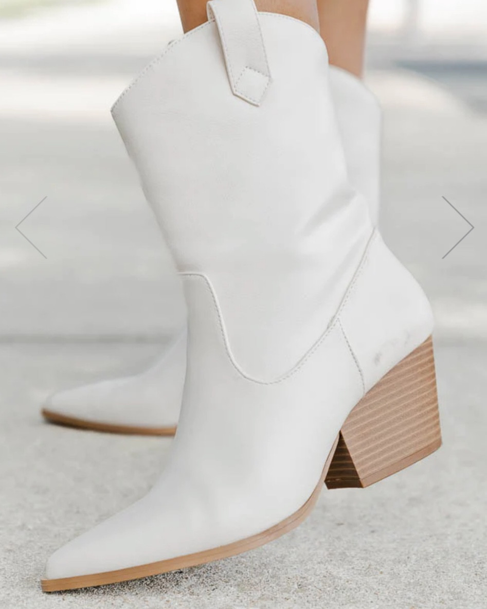 Affordable cowgirl style heeled white ankle boots for fall - only $52

#LTKstyletip #LTKunder50 #LTKshoecrush