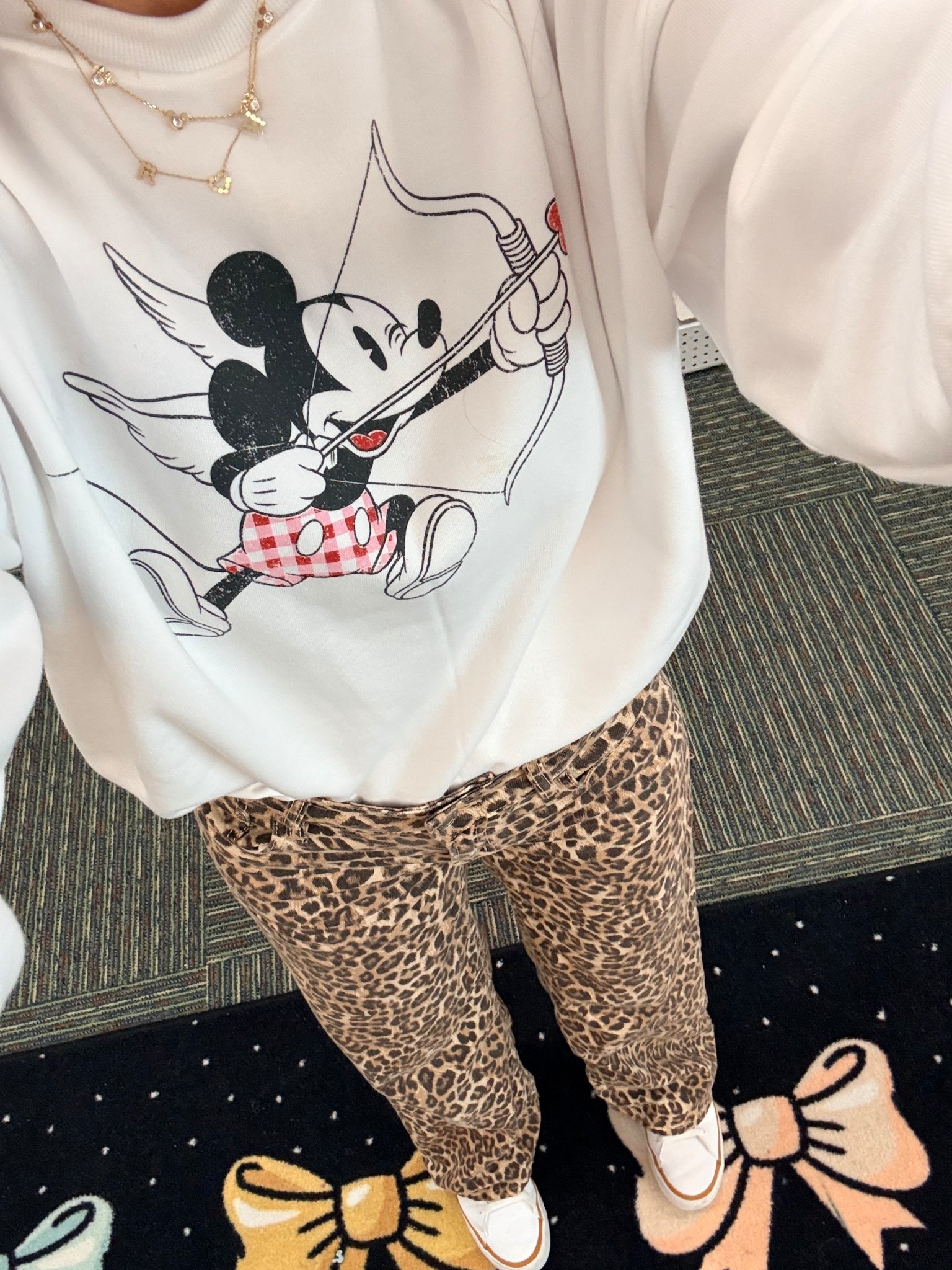 Teacher outfit of the day with comfy wide leg leopard pants from American Eagle and the cutest Mickey Mouse Cupid sweatshirt from Target. ❤️This is my go-to casual classroom look that feels fun but still put together. Perfect for elementary school days, Valentine season, or anytime you want a cozy graphic sweatshirt outfit with sneakers.

Target style, American Eagle leopard pants, wide leg pants outfit, Target Mickey Mouse sweatshirt, Disney sweatshirt outfit, teacher outfit ideas, casual classroom outfit, teacher style, Valentine teacher outfit, comfy teacher clothes, elementary teacher outfit

#LTKSeasonal #LTKValentine #LTKOver40