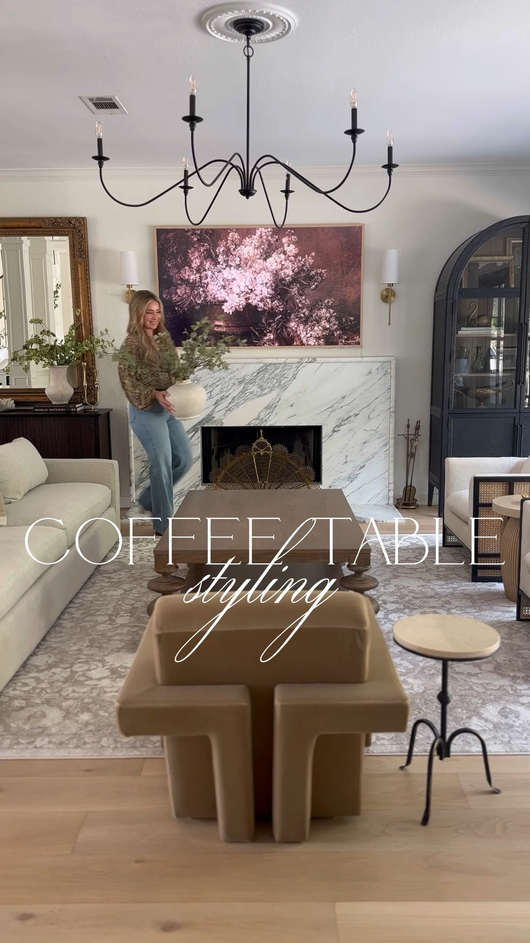 Coffee table styling! These Amazon greenery stems are my favorite! I used 6 stems total. And I love these new fluted glass hurricane candles (I have the 12.5” and 9.5”)! I paired them with this set of flickering LED candles. TIP: I got rechargeable batteries to use with them!

#LTKStyleTip #LTKHome #LTKVideo