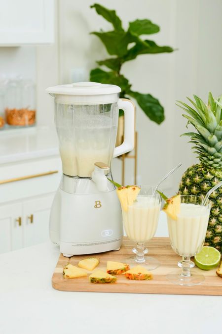 Making Piña Colada using the Beautiful Slush Crush 60 oz 4-Speed Frozen Drink Maker from @walmart #WalmartHome🍹It’s aesthetically pleasing and yet so functional! It even has a dispenser!!! 
#WalmartPartner #WalmartHome  #Walmart  

🥥🍍What you need for 2🍹🍹
* 2 ounces pineapple juice
* 1 ounce fresh pineapple
* 2 ounces cream of coconut
* 1 cup of ice
* 1 fresh lime juice
* Condensed milk to sweeten 
* Pineapple wedge for garnish

🍹Instructions
In a blender, add ice, pineapple juice, fresh pineapple, condensed milk, and cream of coconut.
Blend until smooth.
Pour into desired glass.
Garnish with pineapple wedge.
Serve and enjoy ! 

Easy mocktail recipe, Piña Colada recipe, simple recipe, Walmart home finds , Walmart finds , Beautiful Kitchenware , Beautiful serveware 

#LTKSeasonal #LTKparties #LTKhome