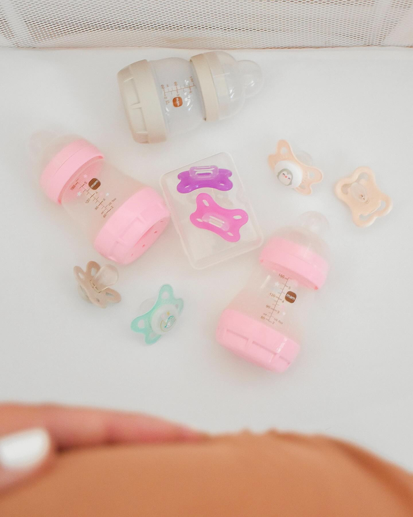 oh baby 🤰🏻 less than 11 days to go - can you believe it?! I’m ready when you are girlie 🩷 I’ve been taking all the bottles and pacifiers out of their packages and getting them ready for some deep cleaning! These anti-colic bottles from @mambaby_usa release milk slowly to help reduce colic in 80% of babies! 🍼 They’re also self-sterilizing which is super cool. You just pop them into the microwave for 3 minutes 👏🏻 the MAM team also sent us some pacifiers. The pink and purple Comfort are full silicone and ideal for newborns while the variety pack comes with the Air, Original, and Original Night (glow in the dark 🌟)! I love having a few options because you never know which baby will prefer 🫶🏻

✨ comment MAM and I’ll dm you a link to shop these baby products and more favorites from MAM! #mambassador 

#babyontheway #babyonboard #babygirlgift #babymusthaves #babymusthave #babygirlgiftideas #giftsforbaby #babygirl #babyshowergiftideas #babyshowergifts #njmoms #babygear #njmomblogger #momblogger #njblogger #babyessentials