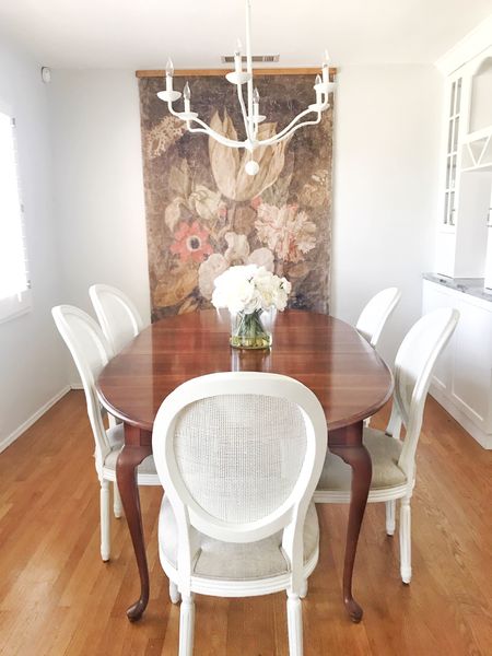 Dining room refresh -new chairs on a classic dining table, some art and a new chandelier gave this dining room new life.  #diningroom #diningroomchairs #art #chandelier 

#LTKunder50 #LTKhome #LTKunder100