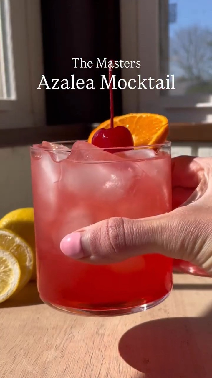 Let’s make The Masters Azalea mocktail! ⛳️ 

If you’re watching the masters this weekend but need a NA option for the signature drink, I’m your girl! It will make you feel like you’re at Augusta National! 

There’s 2 options here for you! One includes NA gin and one does not! The OG recipe asks for vodka, lemonade, grenadine and garnished with a cherry and orange slice. So here is my mocktail girlie spin on it.

Option 1
• 1.25 oz NA gin
• 5 oz lemonade
• 1/2 oz grenadine 
• cherry and orange slice

Option 2
• 1.25 oz pineapple juice 
• 5 oz lemonade
• 1/2 oz grenadine 
• cherry and orange slice

#mocktailrecipe #themasters #azalea #Augusta #mocktailgirlie

#LTKHome #LTKSeasonal