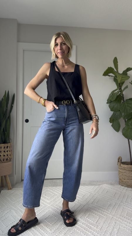 Elevated basic look for summer! Linen tank, cropped jeans, leather slides + bag 

wearing my tts 27 in the jeans (in the longer inseam- I’m 5’10”) + size small in the tank 

#LTKVideo #LTKOver40 #LTKFindsUnder50
