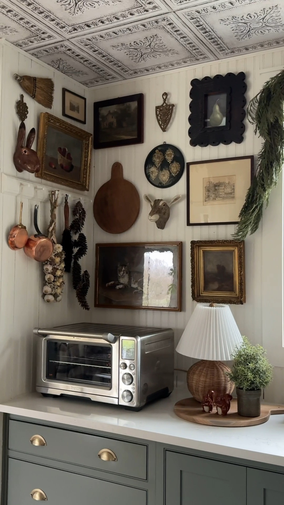 Turning my kitchen into an art gallery 🤭  I love to use templates when making a gallery wall, it makes the process so easy. It’s takes a bit to cut out the shapes but it’s worth it! When I’m ready to hang I just nail wherever the hanging wire is on the frame so no guessing heights or anything!

Most of the art is vintage, but I also discovered these fun ceramics that are perfect for winter and fit in so well with the vintage art! Since most of the art is vintage I found some similar pieces to link!  #vintageart #gallerywall

#LTKVideo #LTKSeasonal #LTKhome