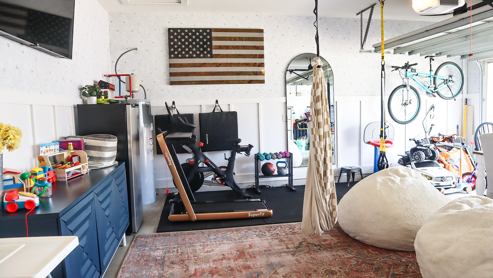 Garage gym with coastal peel and stick wallpaper

#LTKHome