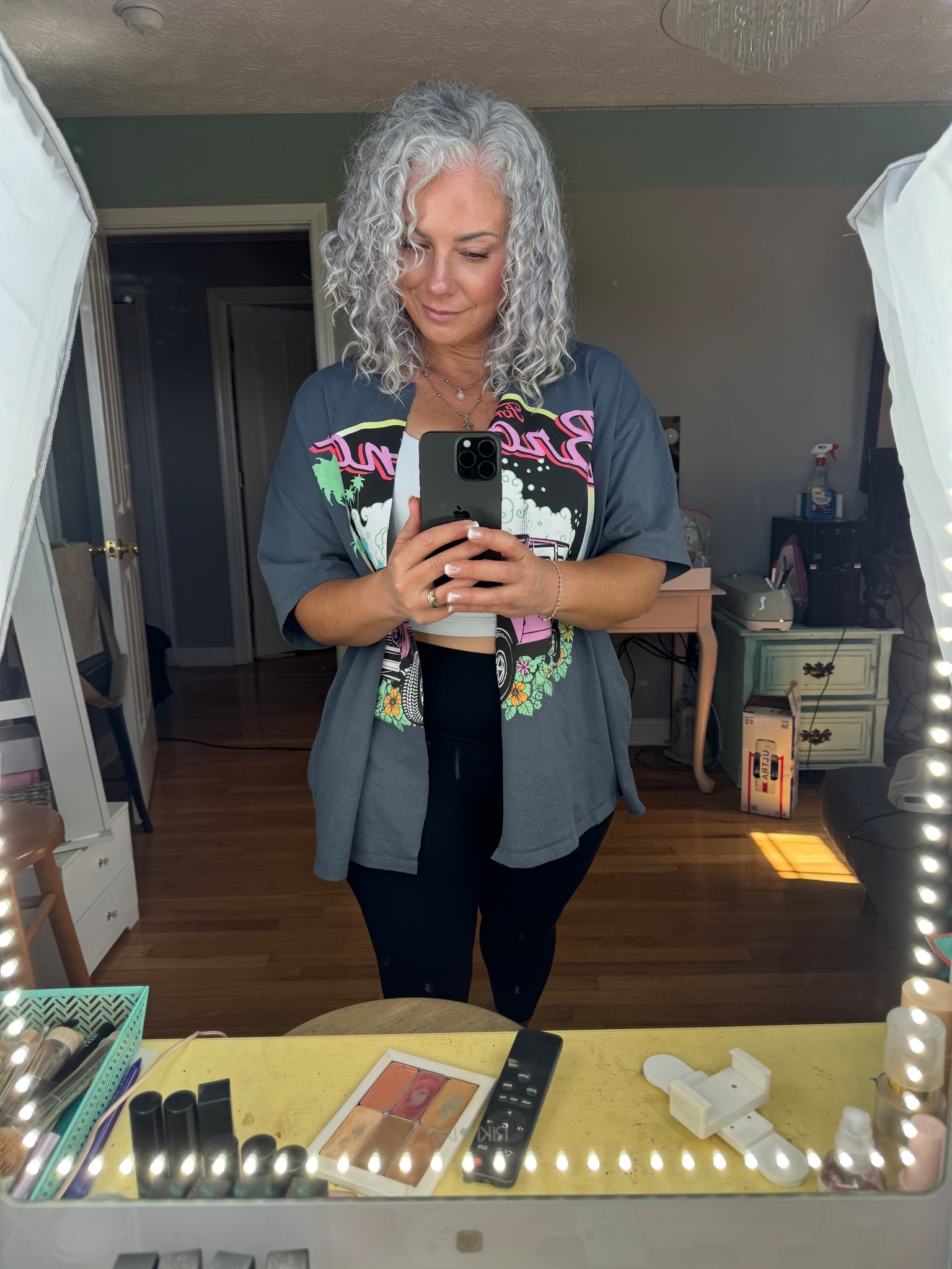 From vintage tee to DIY chic 🤍 I turned this oversized Ford Bronco shirt into a laid-back jacket, layered it over a cropped white cami, paired with buttery-soft black leggings, and finished it off with the cutest trending jelly shoes. Casual, comfy, and cool—all in one scroll-stopping look. #LTKfashion #DIYstyle #jellyshoesareback