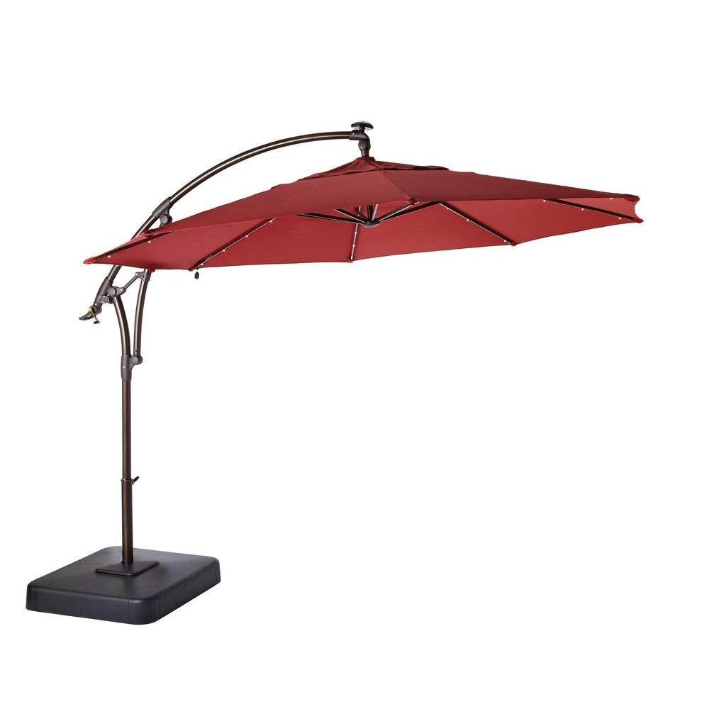 Hampton Bay 11 ft. LED Round Offset Outdoor Patio Umbrella in Chili Red YJAF052 - The Home Depot | The Home Depot