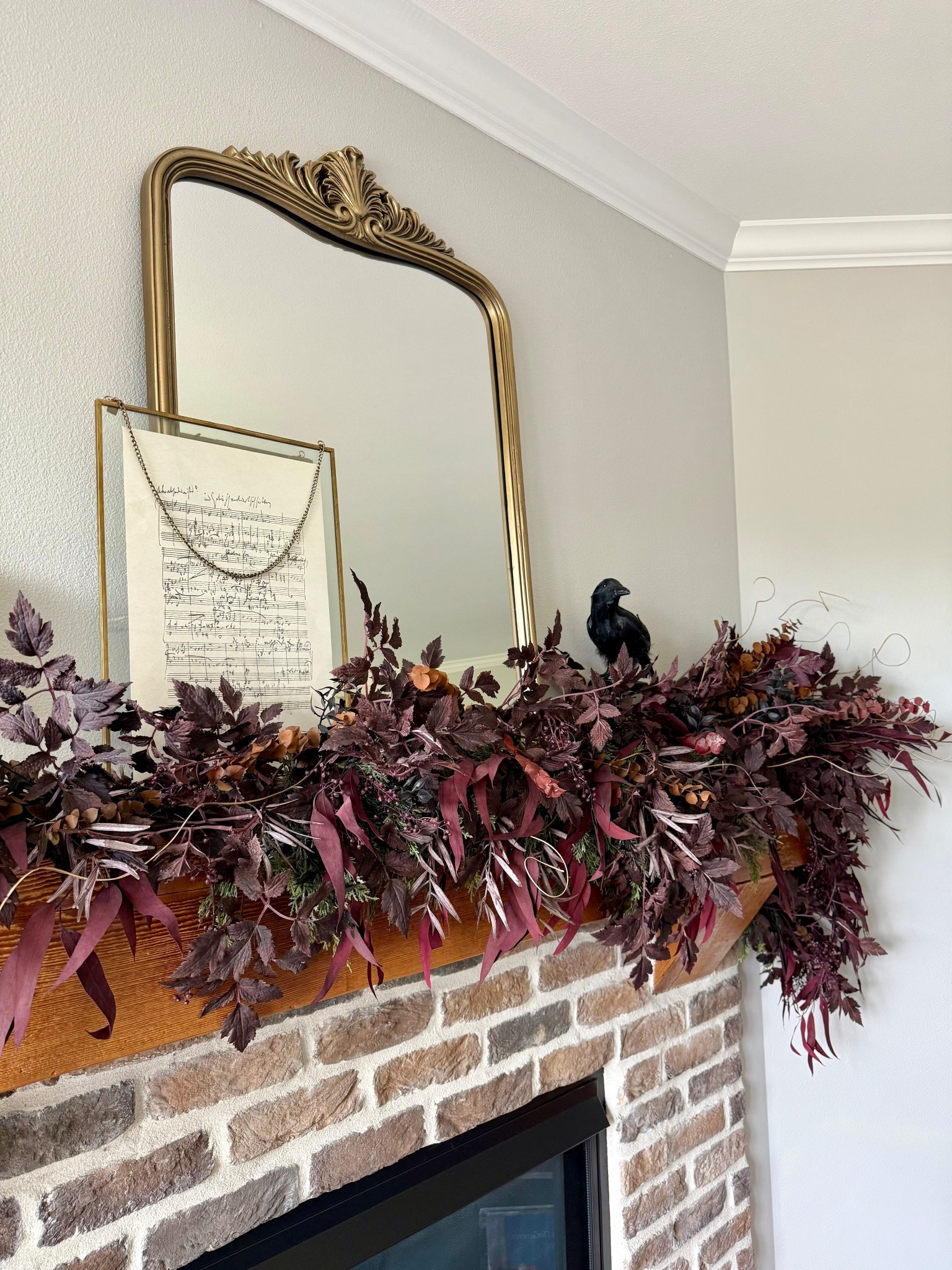 This fall garland is perfect for your mantel now until Christmas - just remove the crow after Halloween  

#LTKHome #LTKSeasonal #LTKHalloween