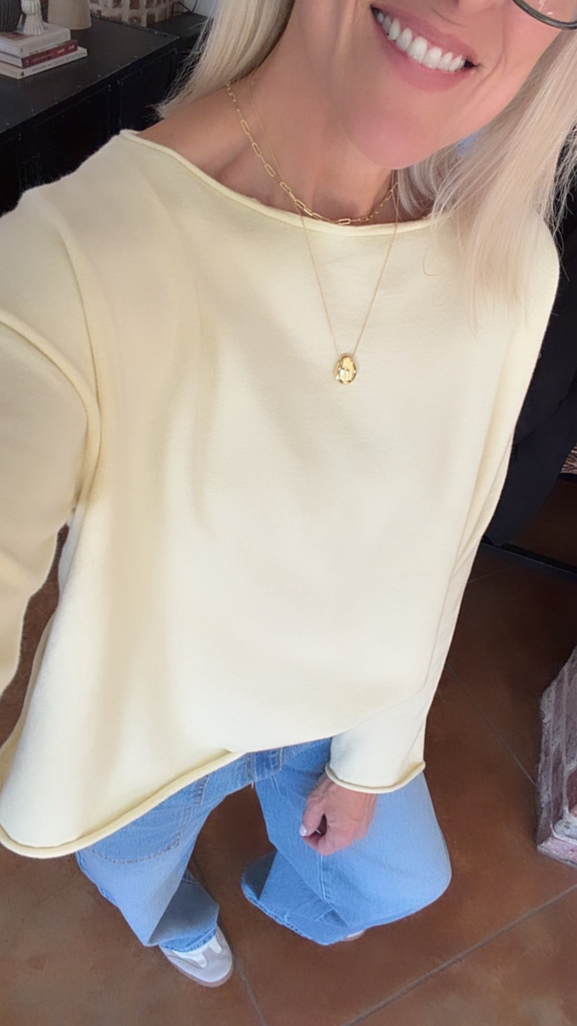 Raw hem sweatshirt. Love this butter yellow color and the boatneck collar 

It is an oversized fit, and I’m wearing my true size of small 

Aerie ￼

#LTKdayinmylife #LTKValentine #LTKOver40