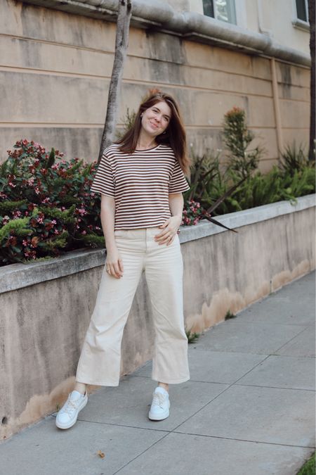 Easy spring outfit - brown and white striped boxy tee, cream wide leg pants. Wearing a s top and a 6 pant , use code LMMENTS15 for 15% off my shirt 

#LTKfindsunder100