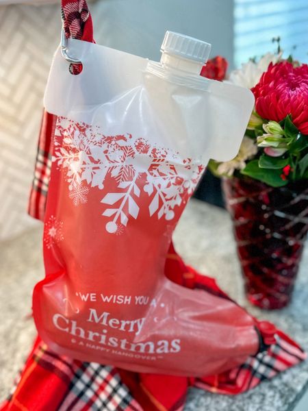 Step up your Holiday Party with this Christmas Stocking Wine Dispenser. #Holidays #ChristmasParty #Holiday2023 #WineDispenser 

#LTKHoliday