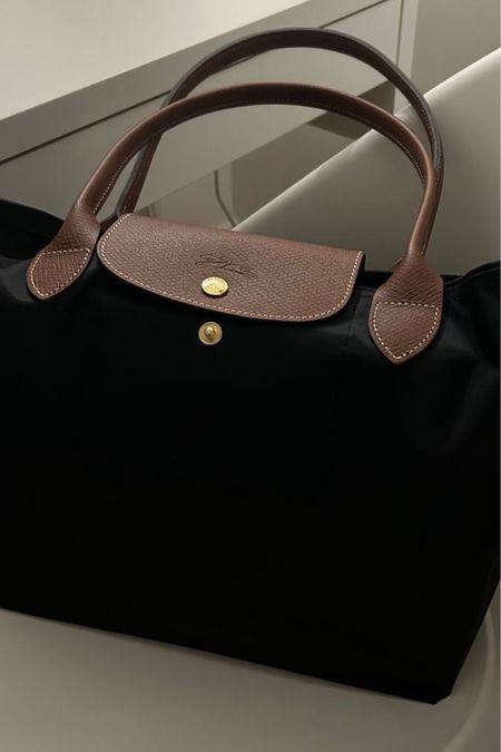 My mum bought me   my first Longchamp Le Pliage almost 15 years ago and it is still one of my favorites. Since then I bought several colors and sizes, from the small coin pouch to the Large travel bag! Just ordered the Green version of the classic black Le Pliage in black color and I’m so excited for it to arrive! #longchamp #lepliage 

#LTKstyletip #LTKitbag #LTKeurope