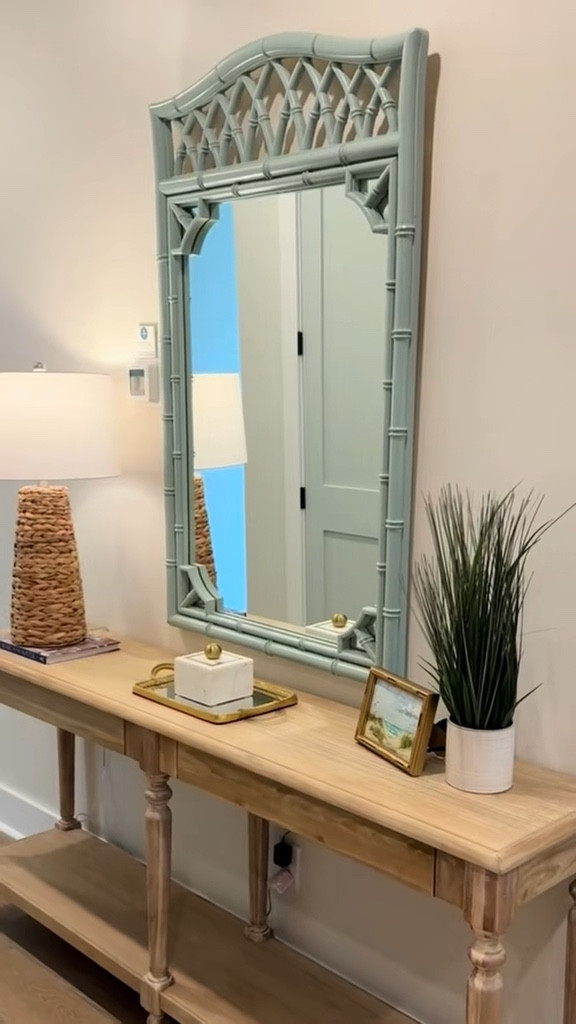 Picked up this yellow bamboo mirror from my client and gave it a transformation! Since it was headed to their beach house, we went with a calm blue to match the vibe.

I started with brushing on masking liquid to keep the glass paint free. Then a couple coats of @sherwinwilliams “Quietude” for that cozy coastal blue. The best part was next… peeling off the masking liquid!!

Now she gets to live by the beach!! #jealous