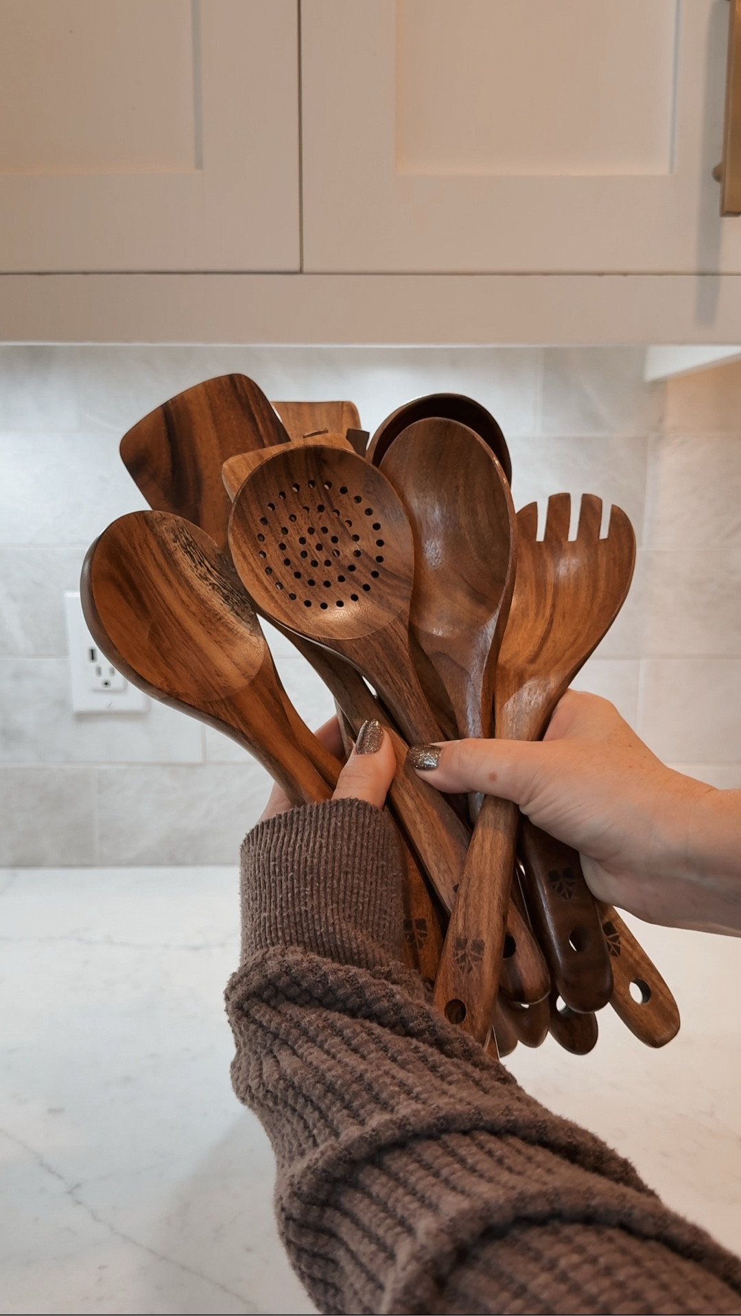 I ditched my old cooking utensils for a healthier, non-toxic option. This 10 piece teak wood utensil set is not only beautiful but functional in your kitchen. They look great in this marble crock on my kitchen countertop. 

LTKfoodie

#LTKHome #LTKmomlife #LTKSaleAlert