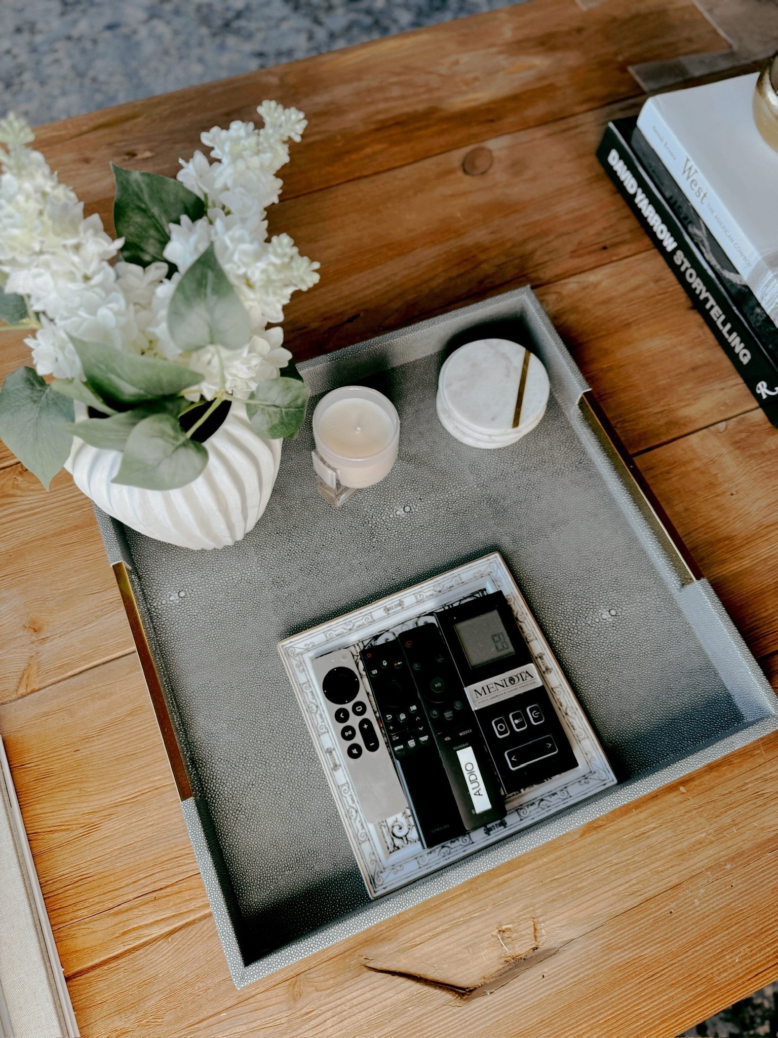 Coffee table styling doesn’t have to be complicated…a chic tray, a candle, and one stunning focal point like a large vase with flowers will have you feeling like an interior decorator! 

#LTKSeasonal #LTKHome