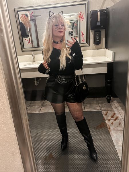Last-minute Halloween costume idea! Sexy black cat 😉 had most of these items in my closet. It’s as easy as an Amazon prime order for ears or a quick party city or target curbside pickup for same day! Think all black, play with lots of lace and leather, add some whiskers and ears, perhaps a tail if you have time, and you’re done! 

Perfect sexy midsize Halloween costume, last minute and on a budget. Make it a couples costume by having your partner be a burglar/robber! Boom: cat burglar 😉 won 3rd place in a costume contest with it! Winning Halloween costume contest. 

Note for the whisker jewels: I did reinforce them with duo eyelash glue before applying. 

#LTKHalloween #LTKsalealert #LTKmidsize