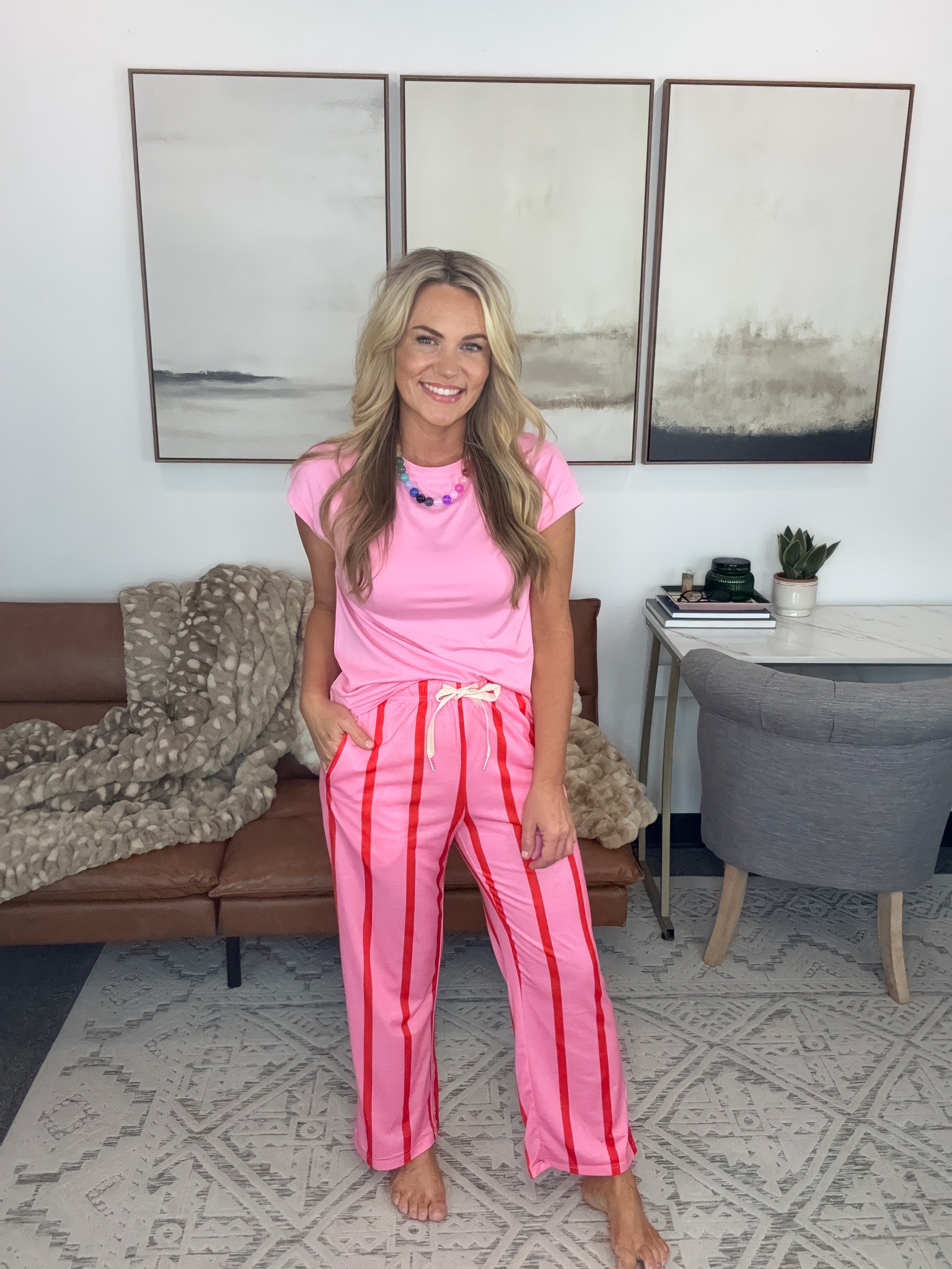 Some days call for color, even when the agenda is doing absolutely nothing. These pink striped lounge pants are relaxed and easy, and the bright tee makes the whole look feel a lot more fun than my usual neutrals.

pink striped lounge pants, women’s loungewear, colorful lounge outfit, pink casual outfit, comfortable pants, weekend style, relaxed outfit, women’s lounge pants, bright color outfit, casual weekend look, AudrieDollins

#LTKTravel #LTKSeasonal #LTKootd