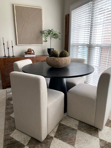 It was time for a kitchen nook refresh and I’m so happy with the new look! I wanted more of a modern, more of a high end designer look but affordable. After seeing these upholstered dining chairs and round table I knew they would be perfect! Modern, comfortable and luxe on a budget! 

#LTKhome #LTKfamily #LTKstyletip