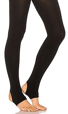 Plush Fleece Lined Stirrup Tights in Black from Revolve.com | Revolve Clothing (Global)