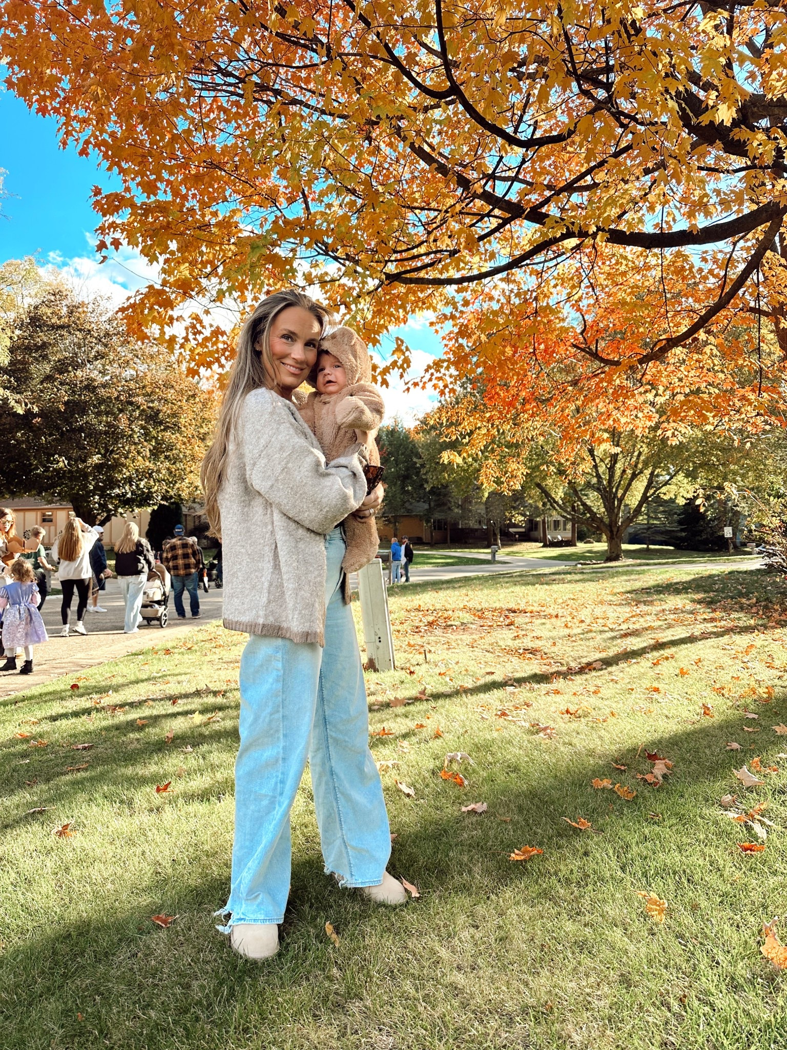 Fall later for mommy. Cozy and soft Amazon cardigan paired with American Eagle wide leg jeans and Ugg micro boots. Baby teddy bear snowsuit from Target  

#LTKOver40 #LTKBaby #LTKShoeCrush