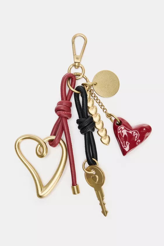 Accessory with charm function featuring hearts and a metal key. Metal clip for use as a strainer.... | Zara US