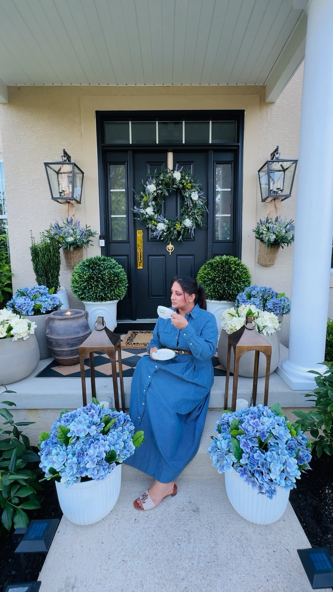 Spring called… she wanted blues, lavender, and hydrangeas everywhere 💙💜
There’s just something about a porch dressed in soft petals and pastel tones that makes you want to slow down and stay awhile.

Would you sit here and have a cup of coffee with me? ☕🌿

Front porch ideas 
Spring outdoor entertaining 
Spring front porch
Spring decor 
Spring planters 
Outdoor rugs 
Outdoor decor 
Outdoor fountains

#LTKSpringSale #LTKSeasonal #LTKHome