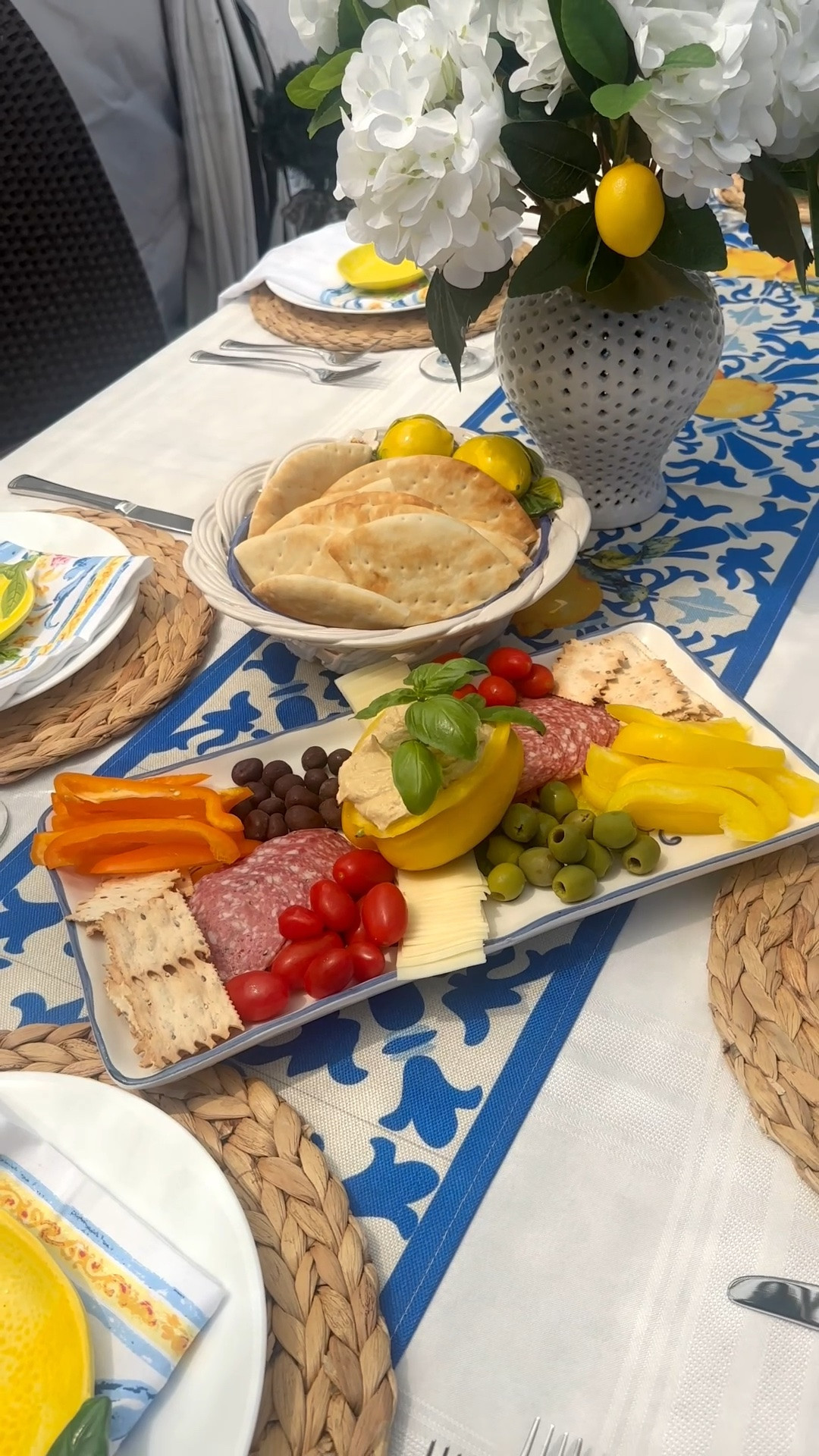 Comment SHOP and I’ll send you links to similar pieces to recreate this easy Memorial Day snack board 🤍🇺🇸

I wanted something that looked festive and elevated without spending hours putting it together… and the little hummus-filled bell pepper ended up being the cutest part of the whole table.

I styled this board with simple grocery store ingredients, warm pita wedges, fresh veggies, cheeses, salami, olives, and all the cozy summer hosting vibes. Perfect for Memorial Day weekend, backyard gatherings, pool days, or casual summer nights on the patio.

I’ve linked similar serving pieces, boards, entertaining finds, and hosting favorites to complete the look.

#MemorialDayHosting #CharcuterieBoard #SummerEntertaining #memorialday #outdoorentertaining

#LTKHome #LTKSeasonal