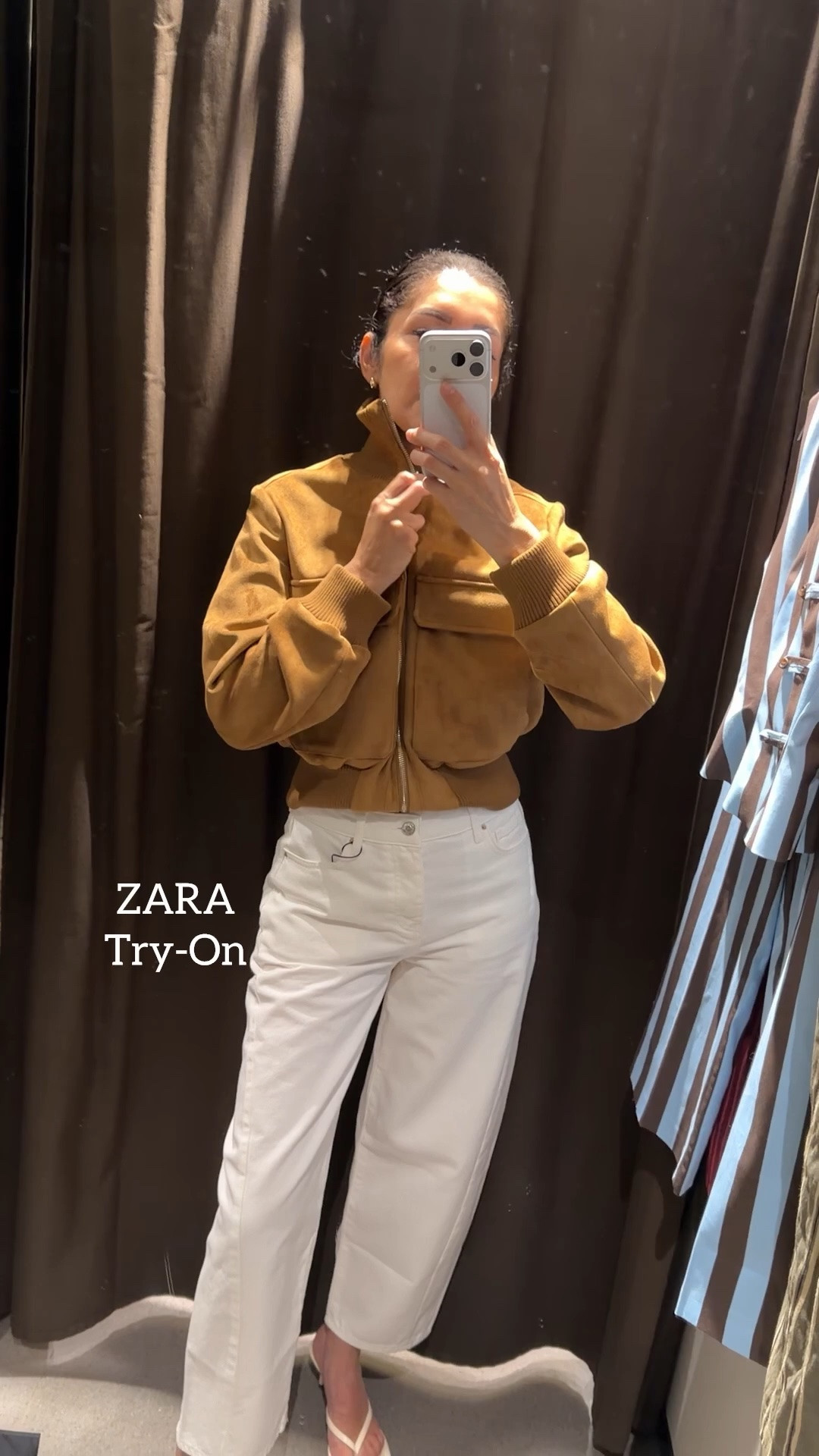 Zara try on haul @Zara 

Zara try-on haul 🤎 This faux suede bomber jacket is a MUST for fall. The suede look, relaxed bomber shape and rich neutral tone make it look so elevated. You need to get this jacket!

Paired it with white barrel jeans for the perfect transitional fall outfit.

FIT DETAILS:
➡️ Zara faux suede bomber jacket — size S
➡️ Zara white barrel jeans — size 36, true to size
➡️ Zara thong sandals — true to size

➫ MY BODY MEASUREMENTS FOR YOUR REFERENCE
Bra: 32C (81 cm)
Waist: 26” (66 cm)
Hips: 38” (96.5 cm)
Height: 5’7” (170 cm)

Zara try on haul | Zara faux suede bomber jacket | suede bomber jacket | Zara fall jacket | Zara white barrel jeans | barrel jeans outfit | Zara new arrivals | fall outfit ideas | transitional fall outfit | Zara outfit | fashion over 40 | fashion over 50

#ZaraFinds #ZaraTryOn #FallJacket #LTKStyle

#LTKSeasonal #LTKOver40