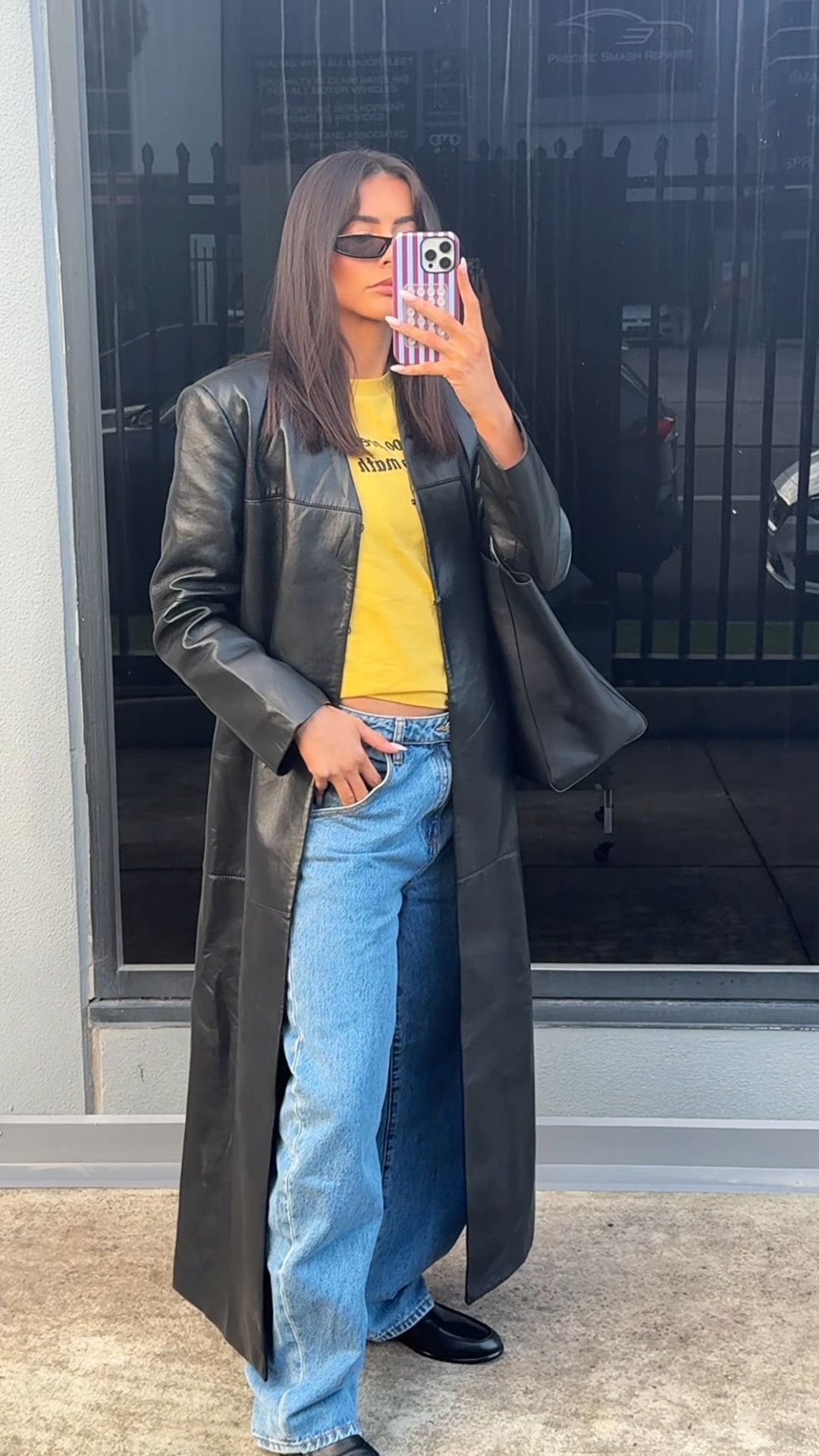 A causal outfit for the office!! Leather coat, black accessories and a pop of yellow. Wearing size 10 in the jeans to make them super low rise (normally I would never but here I am)!!

#LTKaustralia #LTKwinter #LTKjeans