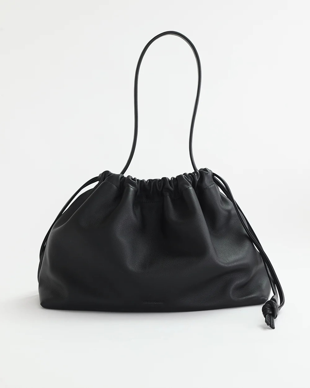 Fin Drawstring bag in black | The Horse (US, AU, UK, NZ)