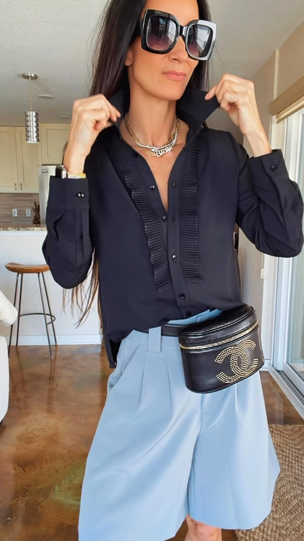 There’s something about an all-black moment that just hits differently.

This tux blouse has that perfect mix of classic and dramatic, and paired with these tailored shorts it gives a little effortless chic energy. 🖤

I kept everything else simple — oversized sunnies, a few layered chains, and this vintage Chanel belt bag that might be one of my favorite pieces in my closet.




#NicoleColeeStyle
#EffortlessChic
#LuxuryStyle
#Over40Style
#LTKFinds




#LTKdayinmylife #LTKgrwm #LTKootd