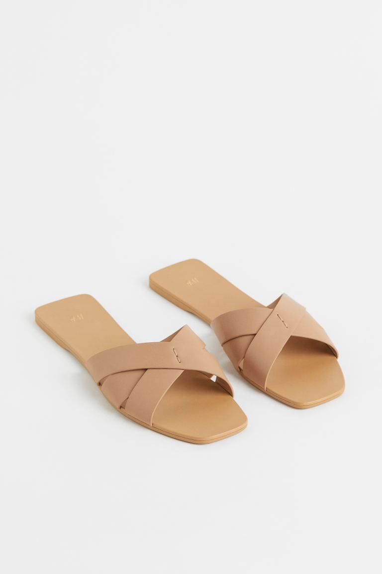 New ArrivalSlides in faux leather with wide, crossover foot straps and square toes. Faux leather ... | H&M (US + CA)