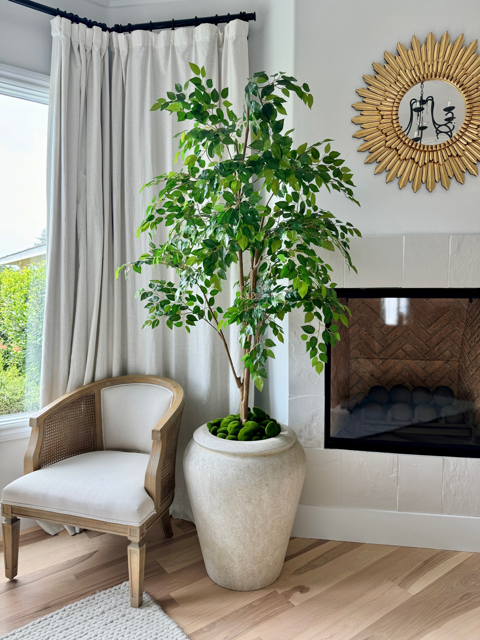 This faux 7ft ficus tree in the washed alabaster planter brings balance and aesthetic to our space 

#LTKSaleAlert #LTKHome