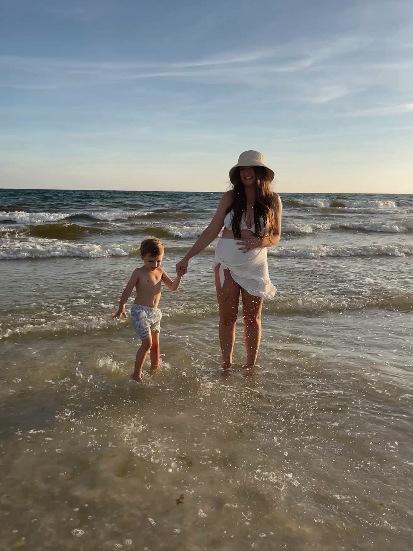 soaking in our last summer as a family of three before sweet girl makes her arrival 🐚👶🏼 🤍🌊