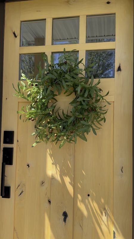 Artificial 22 inch olive outdoor wreath - simple & full of spring! We love our wooden door from Home Depot - definitely recommend if you’re redoing your front porch door! 



#LTKSeasonal #LTKstyletip #LTKhome