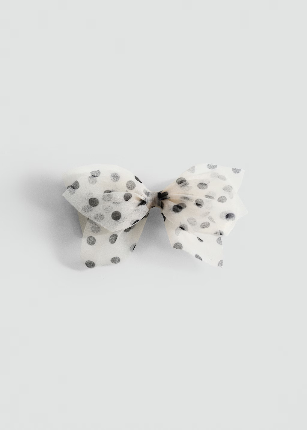 Polka-dot bow clip - Women | MANGO United Kingdom | MANGO (UK)