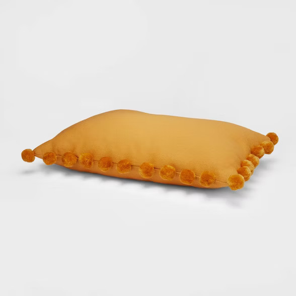 Oblong Pom-Pom Throw Pillow - Pillowfort™ | Target