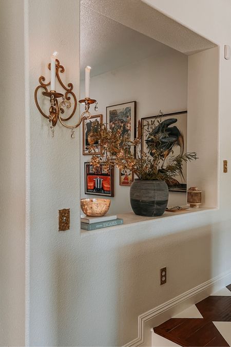 Don’t let not having wired sconces hold you back from adding that sculptural interest and most importantly that beautifully warm, cozy glow in your space. Keep an eye out at your thrift shops for these beauties. They are the ideal complement to paintings, artwork, or plain hallways that require drama. #candlewallsconces #sconcesmakeover 

#LTKhome #LTKstyletip