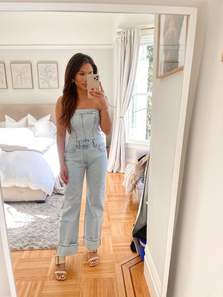 Denim jumpsuit - wearing xs petite but the bust runs small I would size up if your have a larger bust 