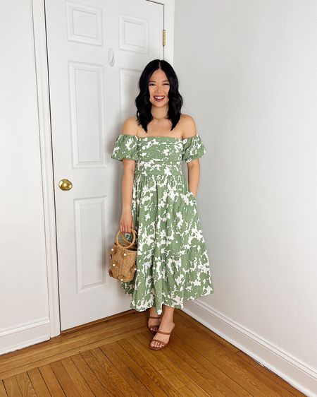 Green floral dress with pockets (SP)
Green floral midi dress
Green off the shoulder dress
Floral off the shoulder dress
Floral bag
Straw bag
Straw bucket bag
Brown mule heels
Abercrombie dress
Wedding guest dress 
Spring dress

#LTKwedding #LTKfindsunder100 #LTKSeasonal