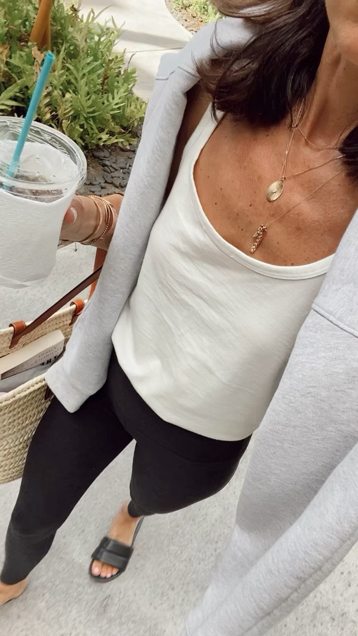 Travel outfit 
Buttery soft leggings 
Basic white tank 
Oversized grey sweatshirt 
Comfortable sandals 

#LTKstyletip #LTKtravel