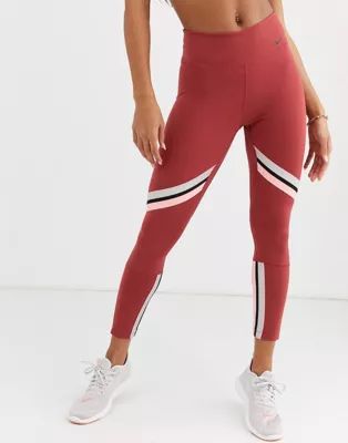 Nike Training crop leggings with gold sparkle trim in pink | ASOS (Global)