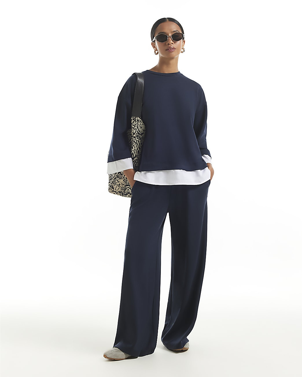 Petite Navy Premium Wide Leg Trousers | River Island UK & IE