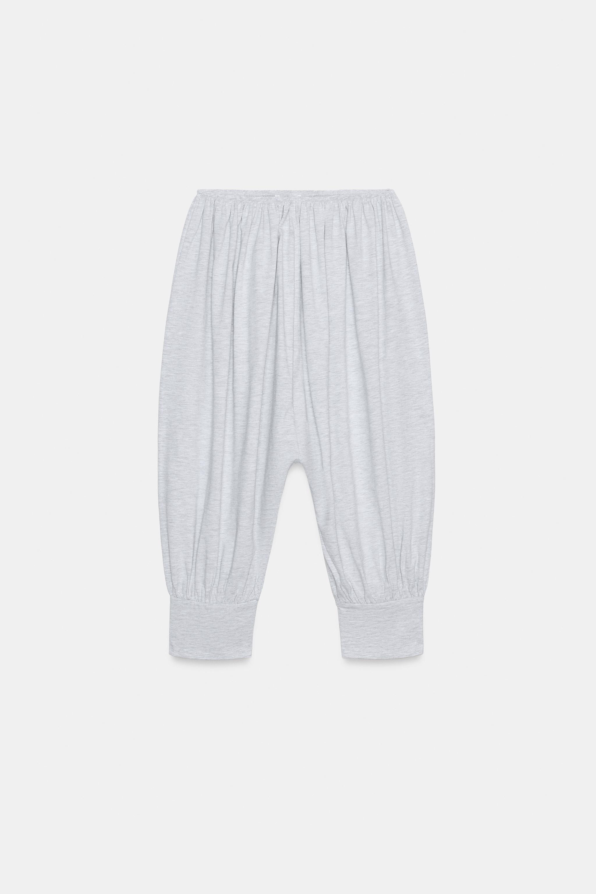 Mid-waist trousers with an elastic waistband and puffed hem. | Zara UK